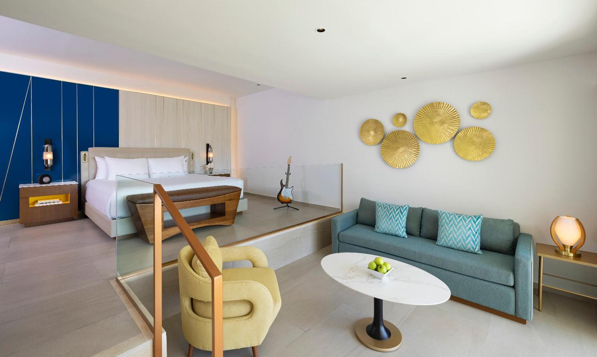 Suite Caribbean con cama extragrande y sofá